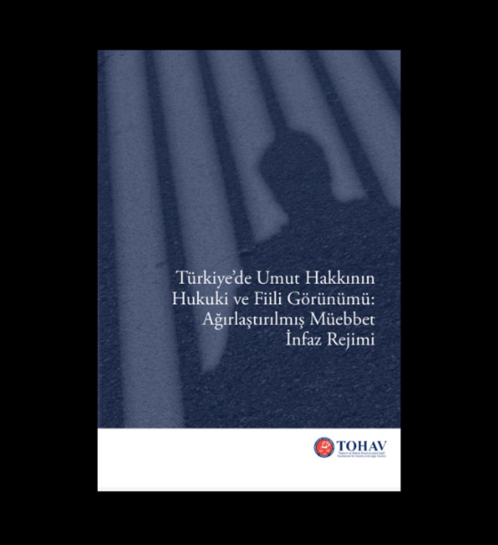Parmaklıklar ve gölgeyle hapishane kapağı, TOHAV logosu.